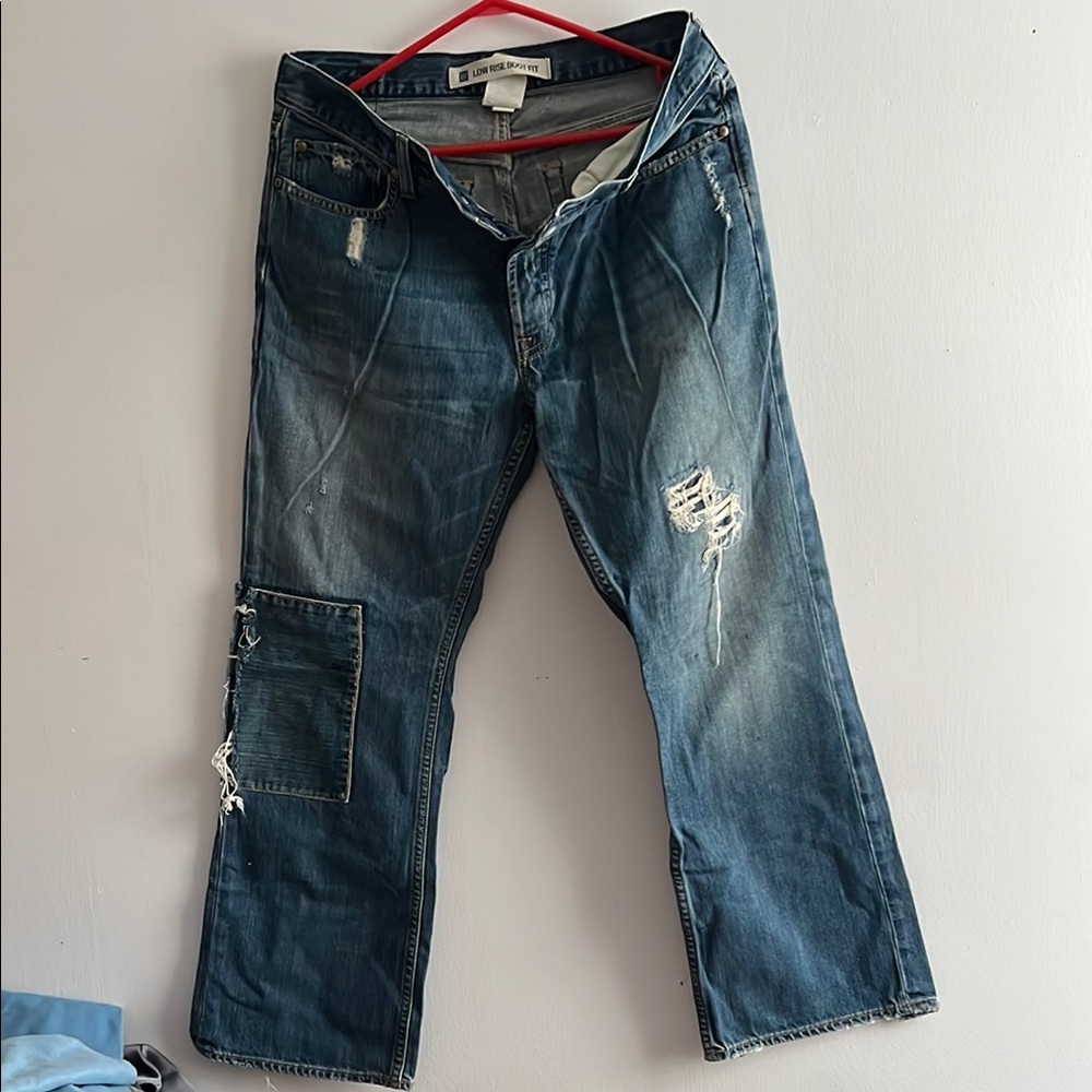 Relaxed Fit Distressed Blue Jeans with Fading and Rips